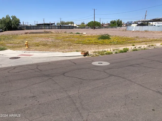 a view of a water with a large building in the background