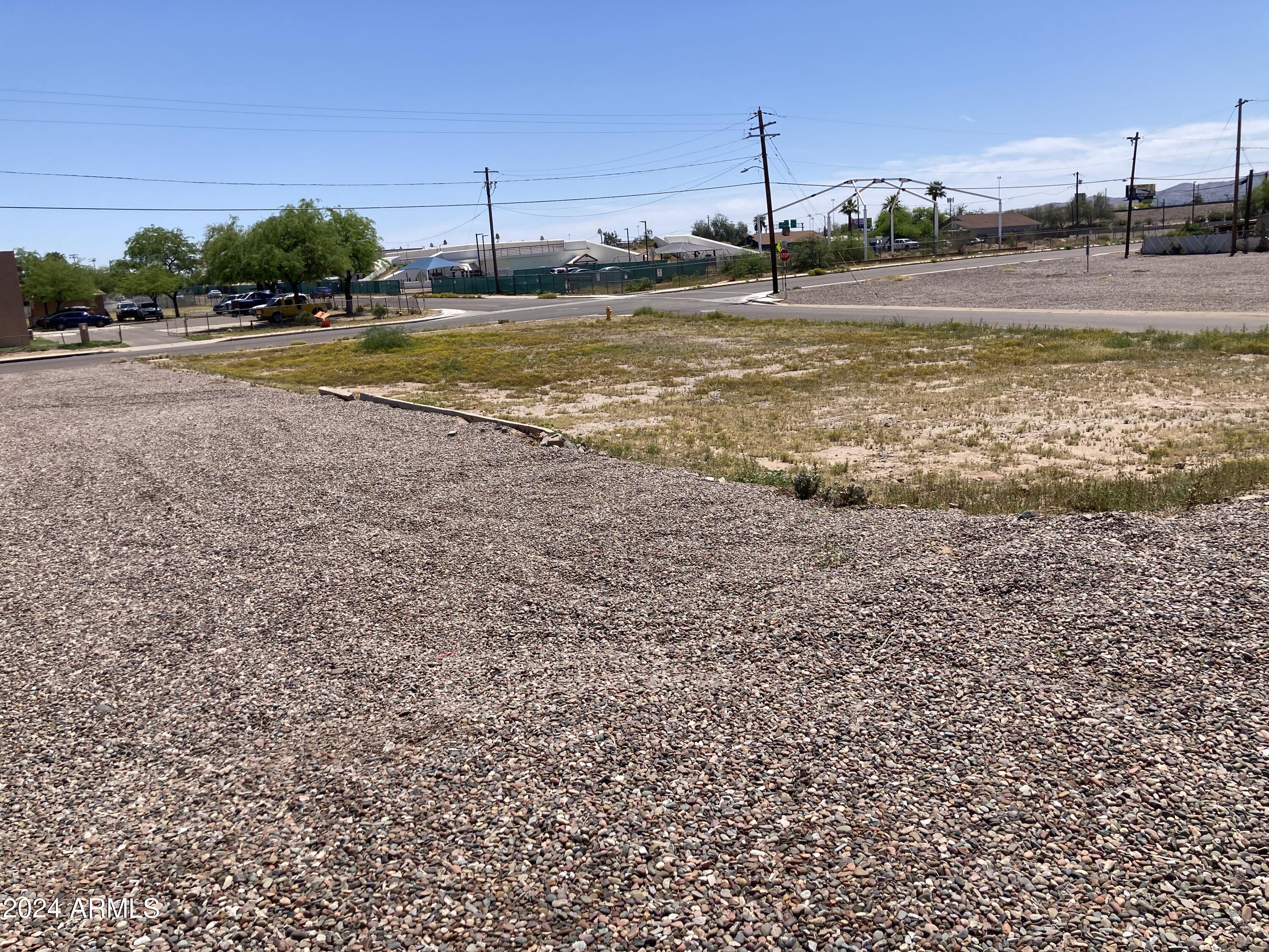1824 South 12th Street, Unit 175 Phoenix, AZ 85034 - Photo 3 of 7 a view of a water with a large building in the background