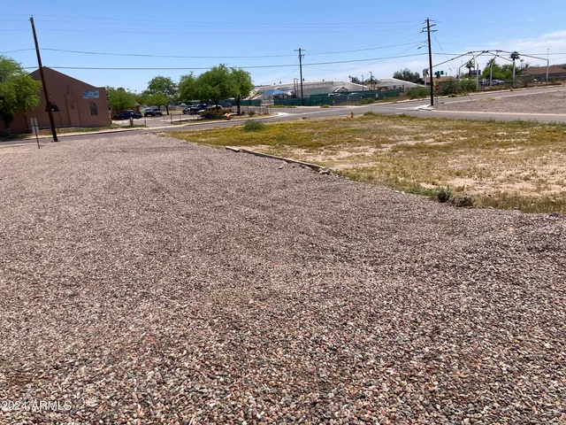 a view of a swimming pool and a yard