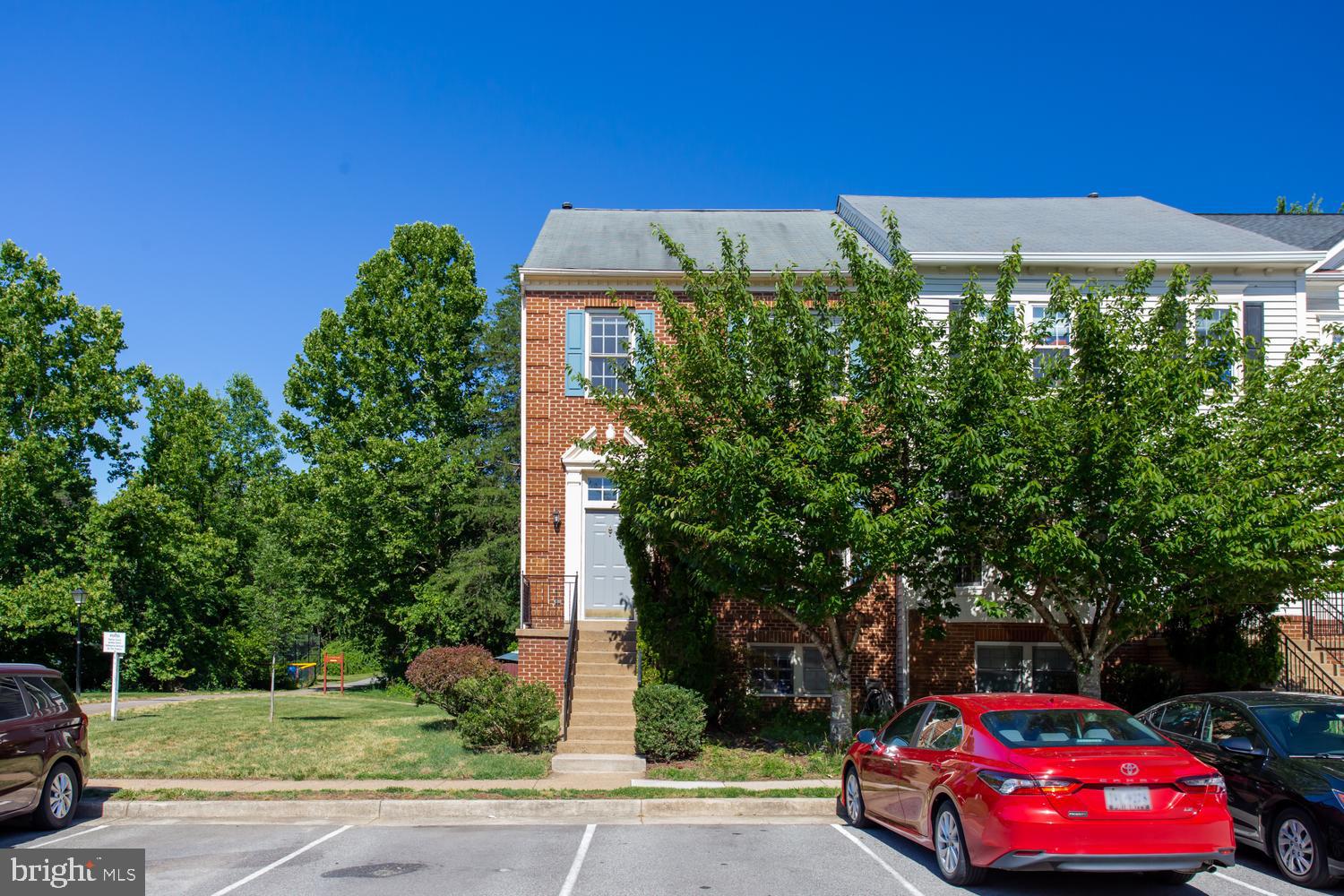 6248 Levi Court Springfield, VA 22150 - Photo 34 of 51 Charming brick townhouse with greenery.