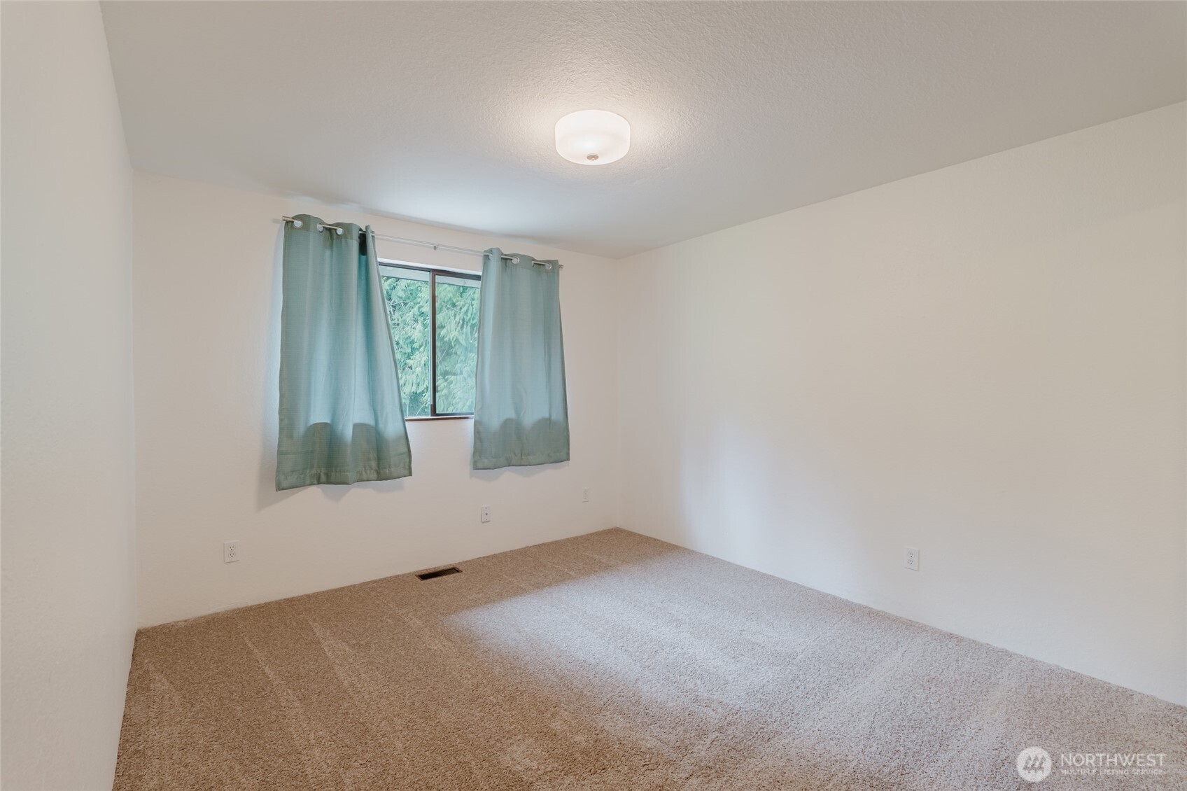 41 Meadowood Drive Elma, WA 98541 - Photo 16 of 40 a view of an empty room with a window