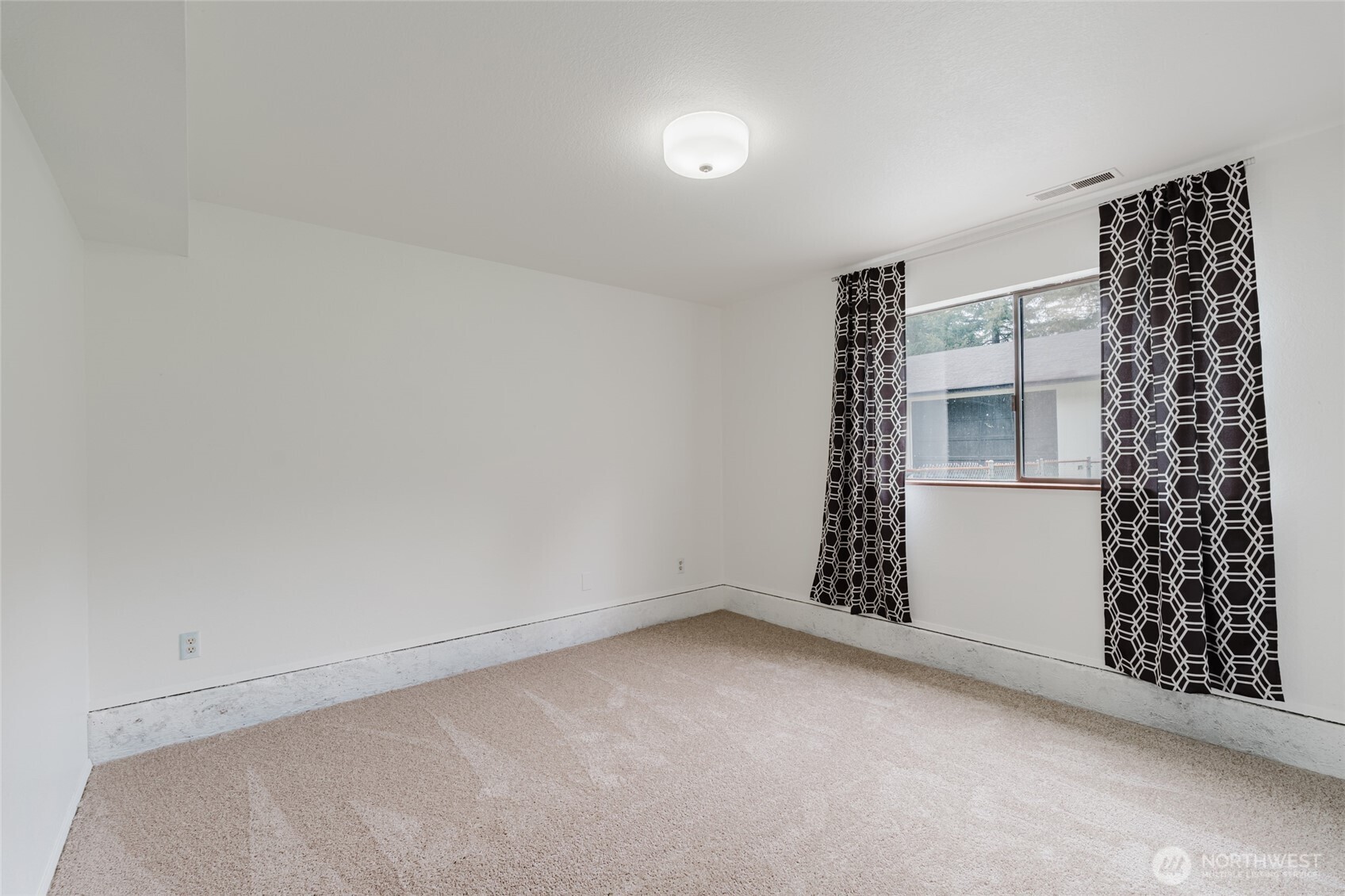 41 Meadowood Drive Elma, WA 98541 - Photo 30 of 40 a view of an empty room with a window