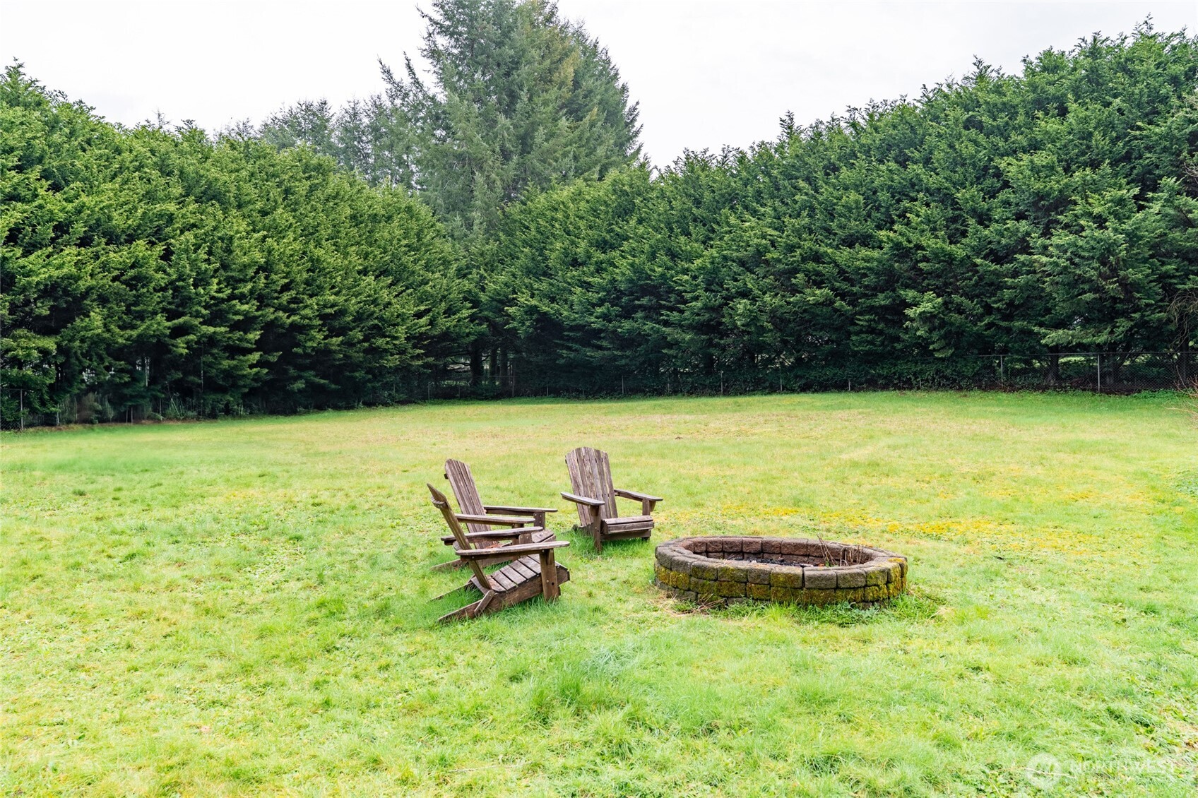 41 Meadowood Drive Elma, WA 98541 - Photo 34 of 40 a view of a swimming pool and lounge chairs