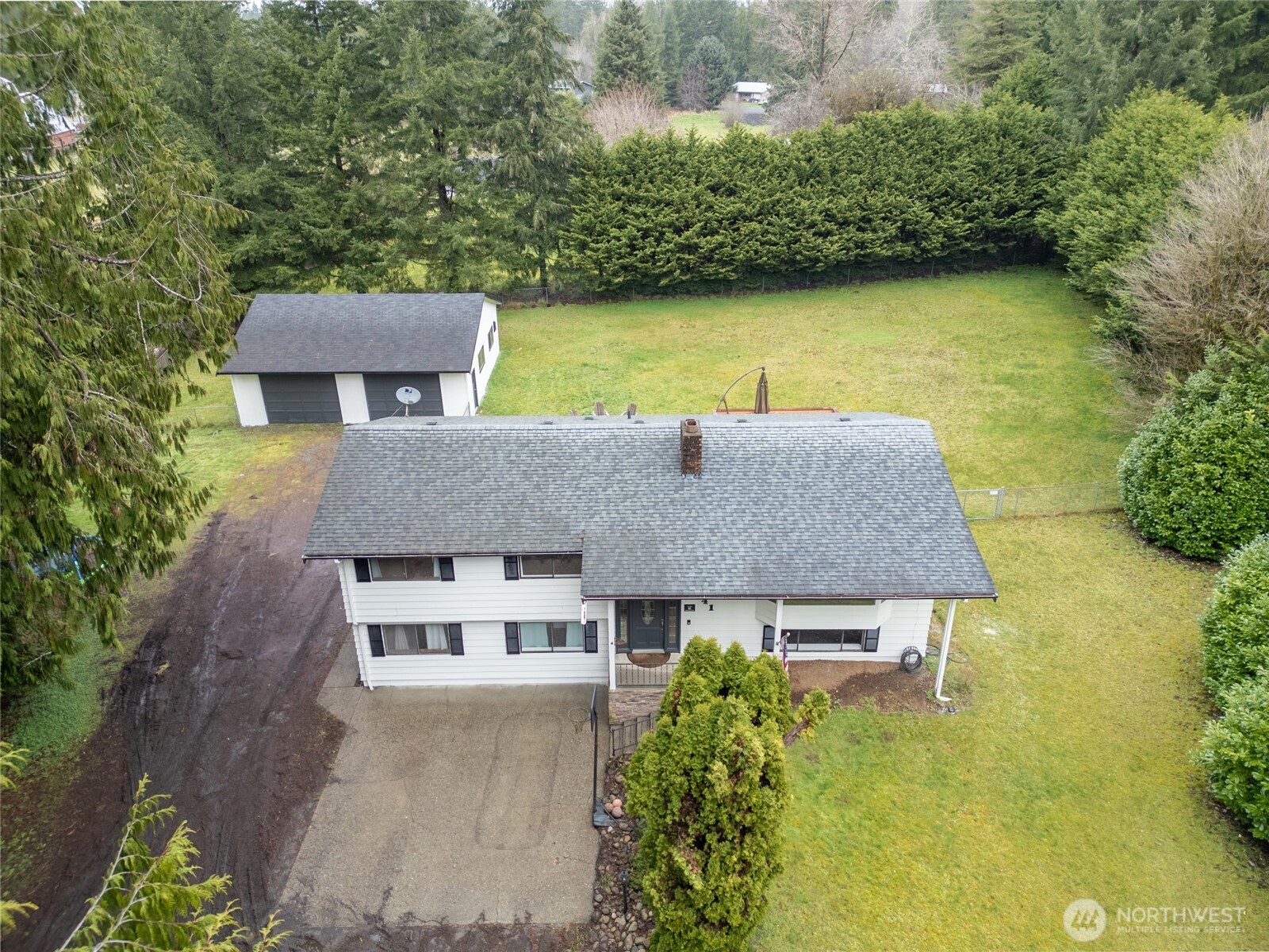 41 Meadowood Drive Elma, WA 98541 - Photo 37 of 40 an aerial view of a house with swimming pool and garden