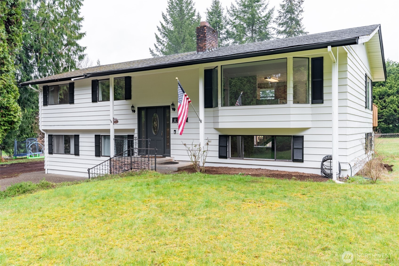 41 Meadowood Drive Elma, WA 98541 - Photo 40 of 40 a view of a house with a yard and sitting area
