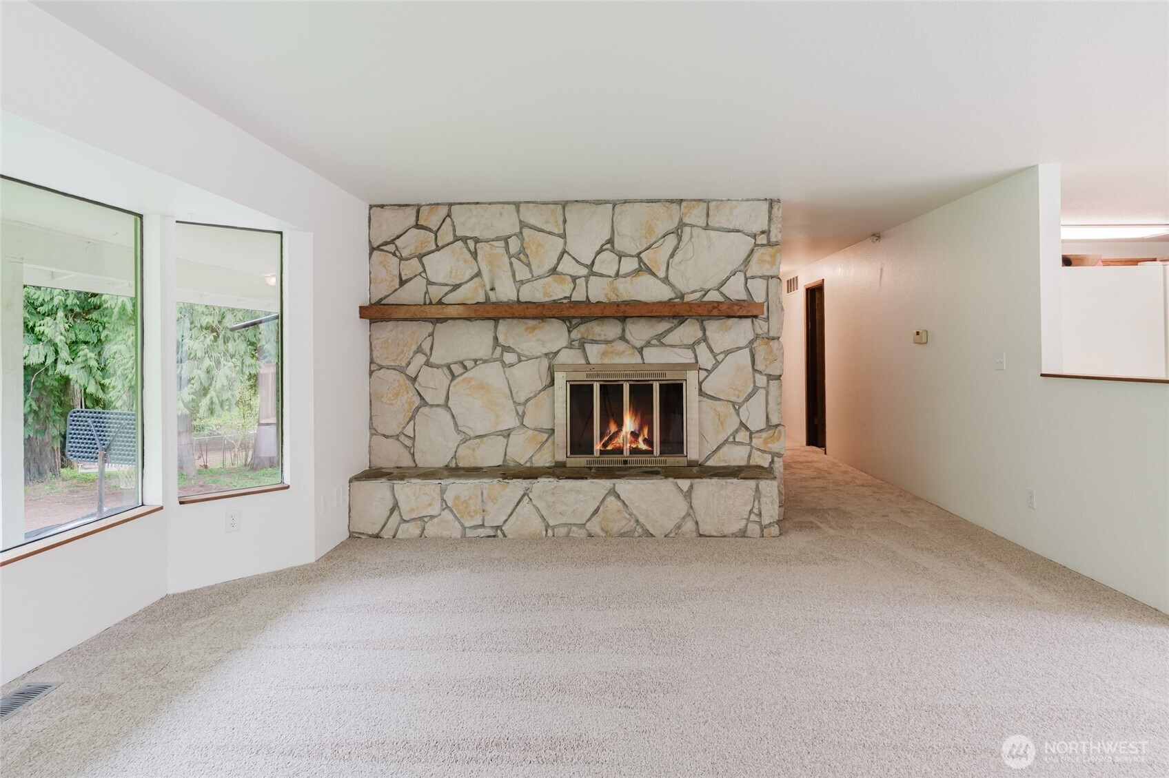41 Meadowood Drive Elma, WA 98541 - Photo 6 of 40 a view of fireplace and window in an empty room