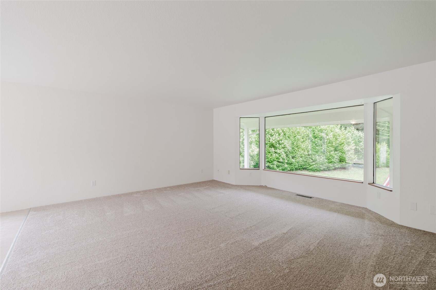 41 Meadowood Drive Elma, WA 98541 - Photo 8 of 40 an empty room with windows