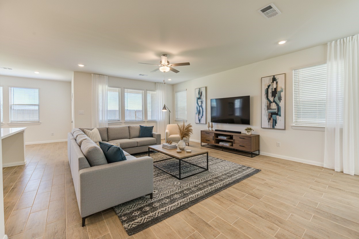 21707 Cypress Trellis Drive Cypress, TX 77433 - Photo 1 of 24 a living room with furniture and a flat screen tv