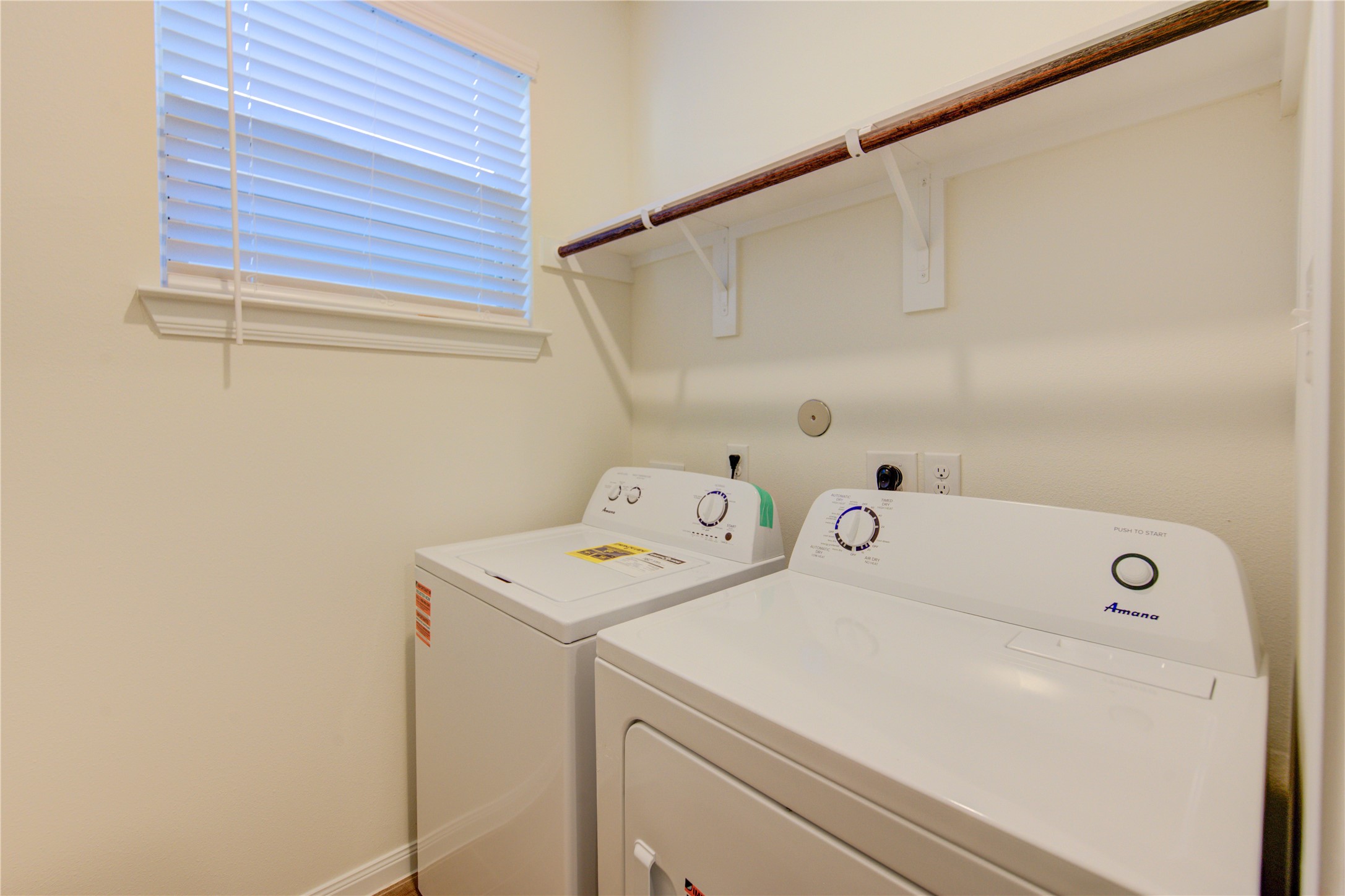 21707 Cypress Trellis Drive Cypress, TX 77433 - Photo 12 of 24 a utility room with dryer and washer