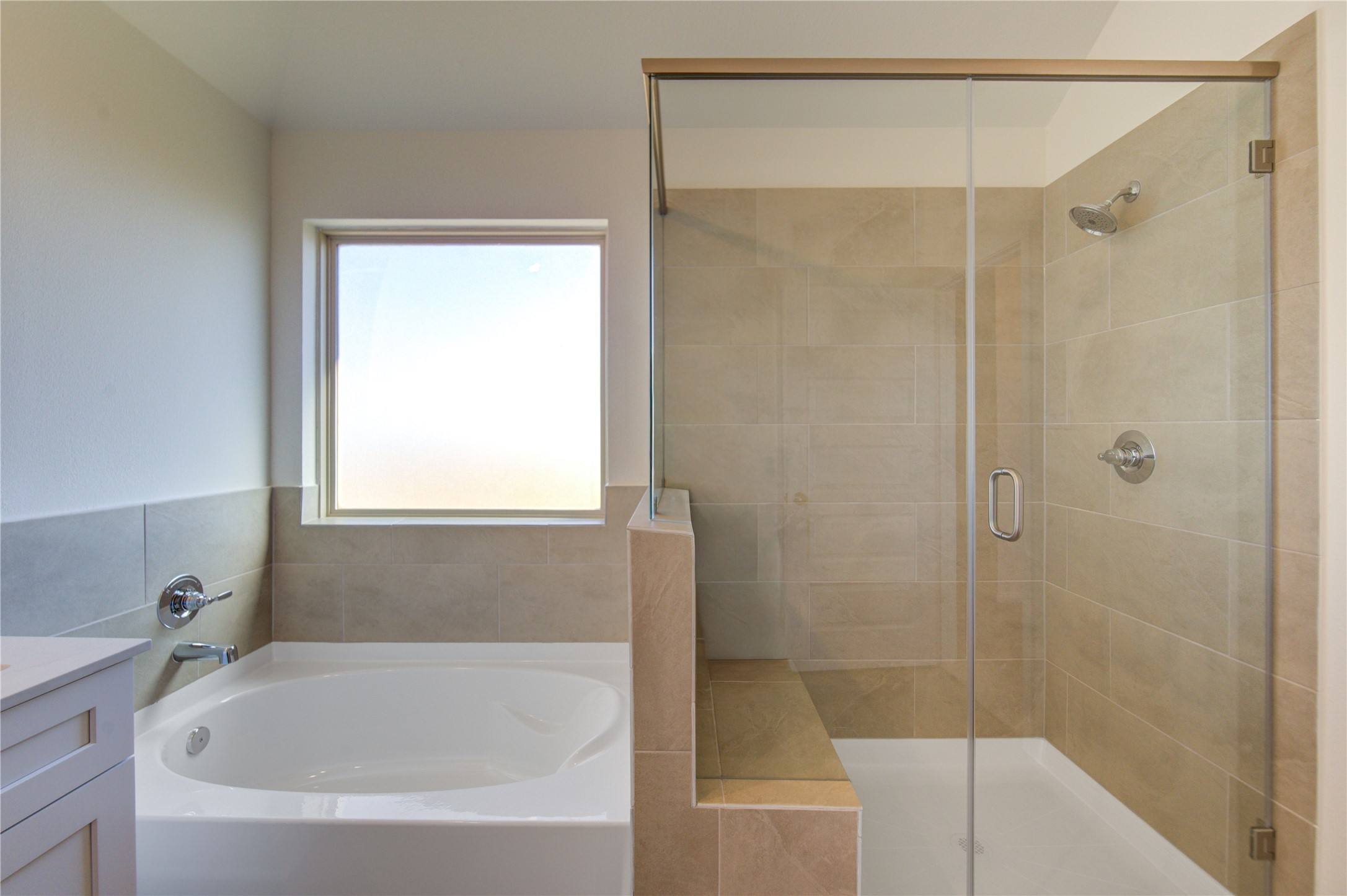 21707 Cypress Trellis Drive Cypress, TX 77433 - Photo 17 of 24 a bathroom with a bathtub and shower