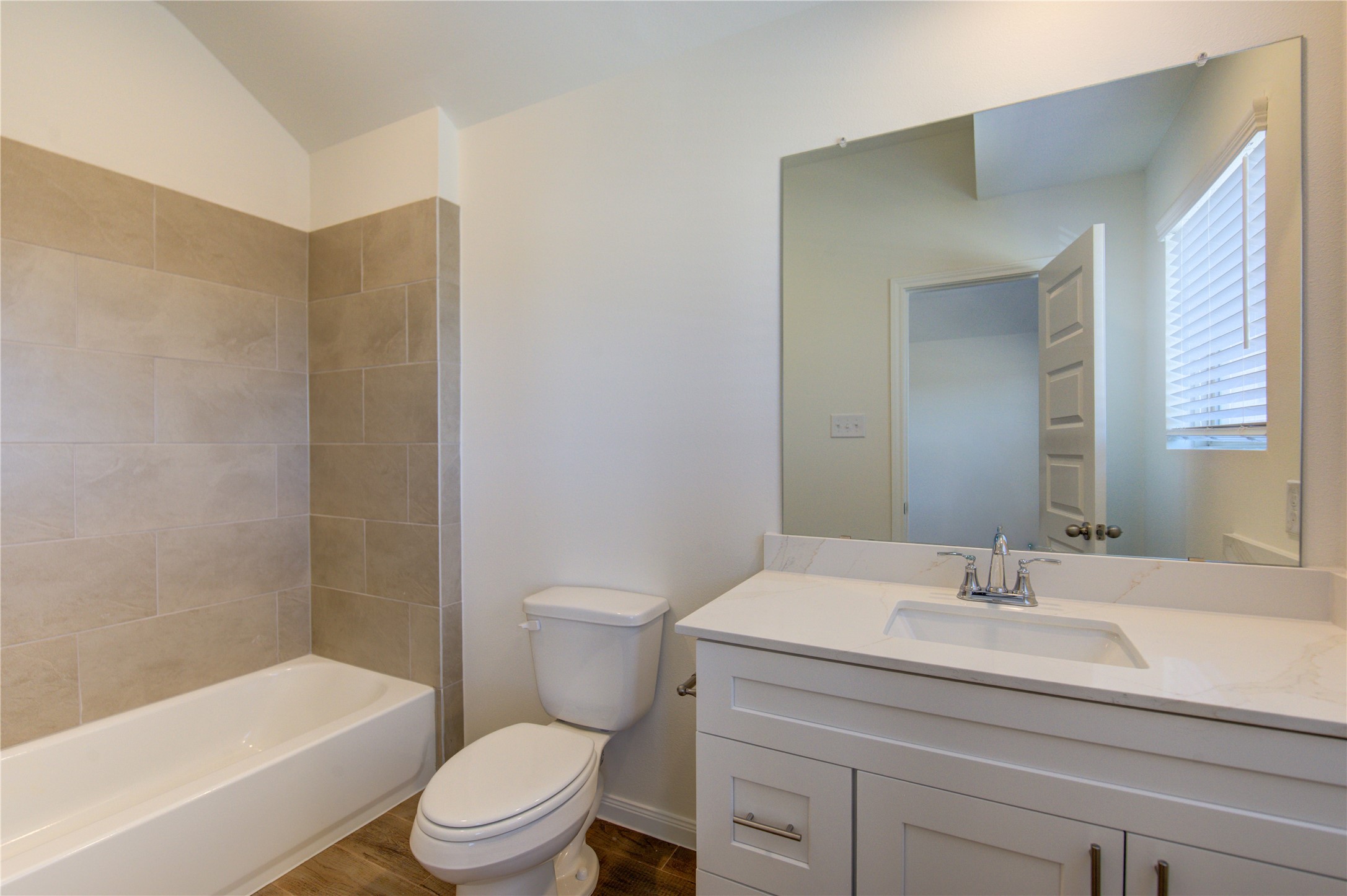 21707 Cypress Trellis Drive Cypress, TX 77433 - Photo 19 of 24 a bathroom with a sink toilet and a bathtub