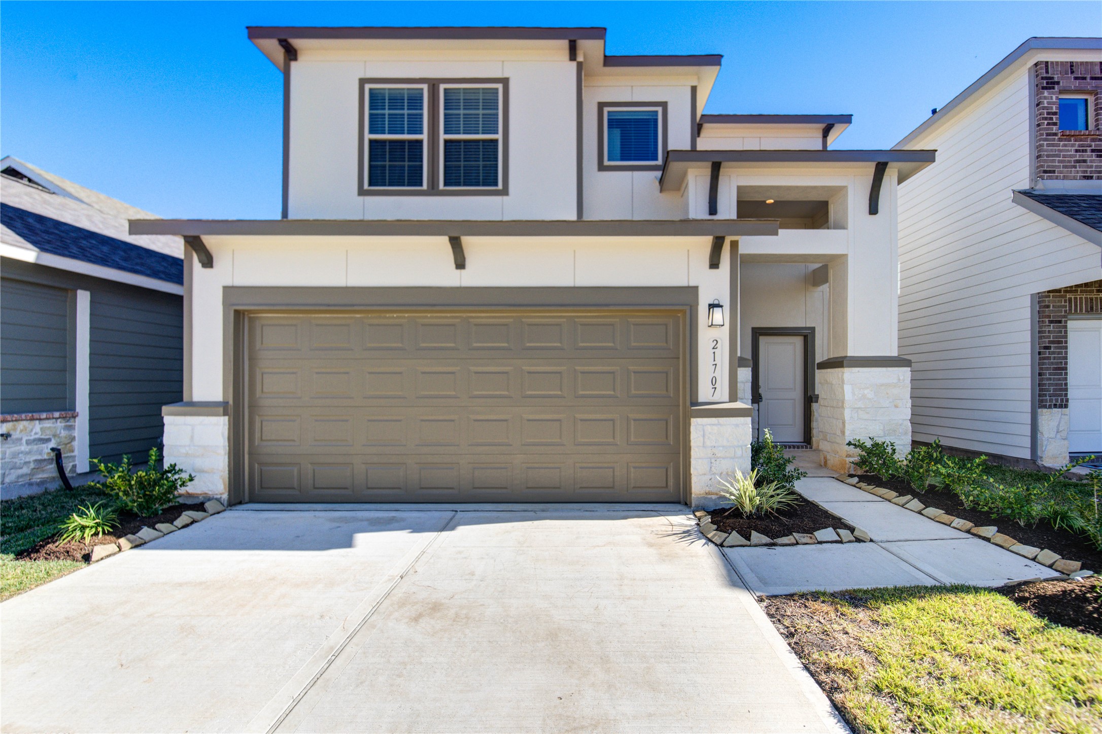 21707 Cypress Trellis Drive Cypress, TX 77433 - Photo 3 of 24 a front view of a house with garden