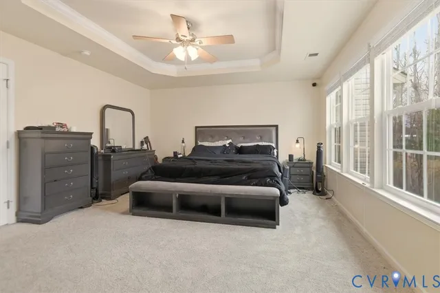 a bedroom with a bed and furniture
