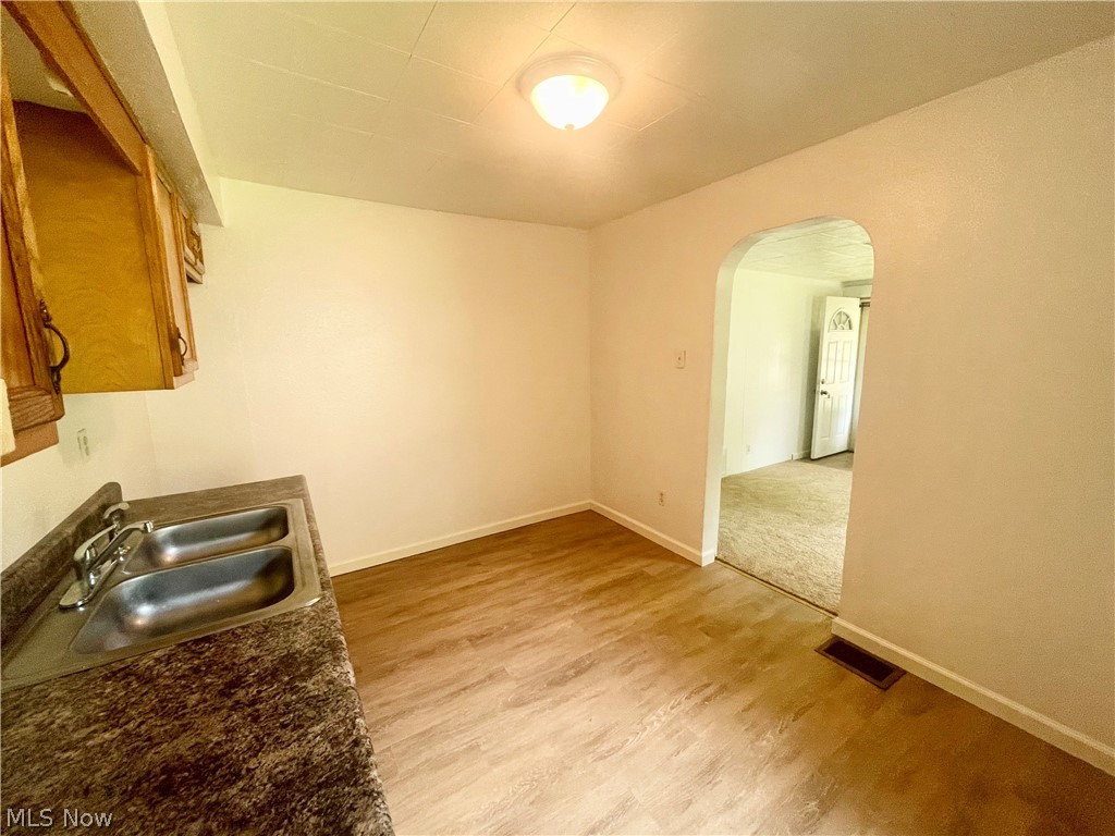 978 Cove Road Weirton, WV 26062 - Photo 5 of 18 Kitchen with light hardwood / wood-style floors and sink