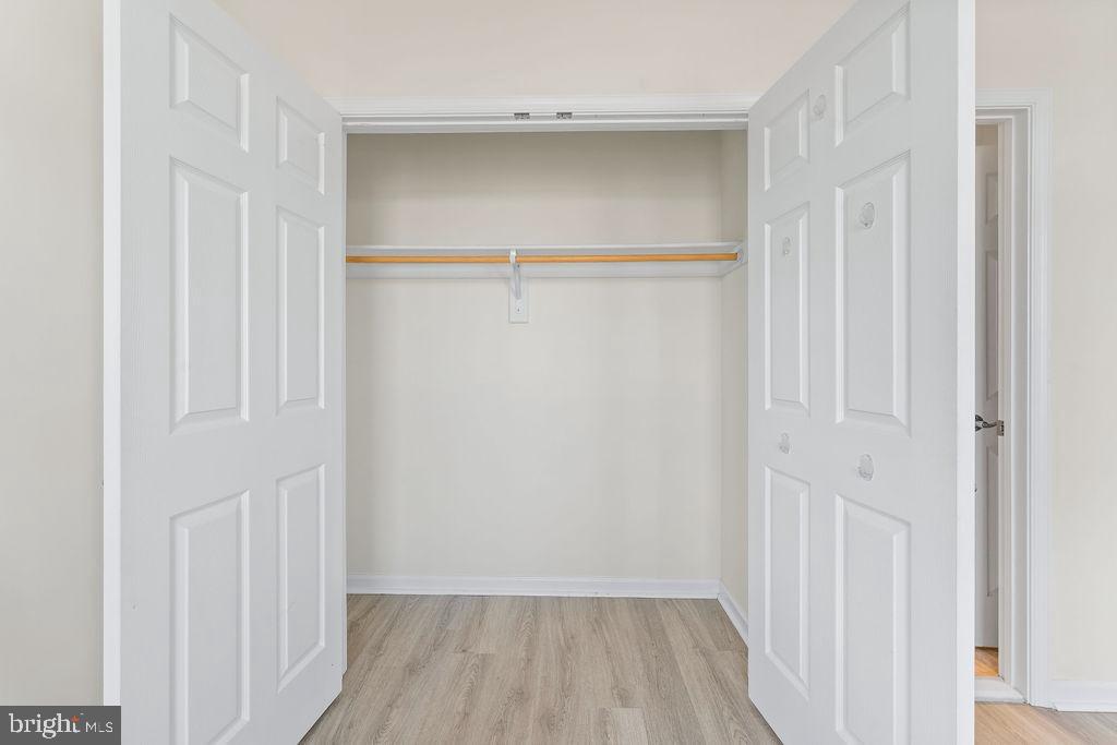 3542 Worthington Boulevard, Unit 301 Frederick, MD 21704 - Photo 13 of 22 a view of a room with wooden floor