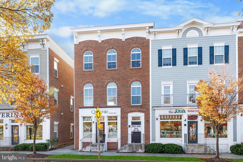 3542 Worthington Boulevard, Unit 301 Frederick, MD 21704 - Photo 22 of 22 a front view of a building with garden