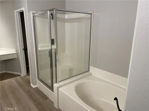 a bathroom with a sink double vanity and a mirror