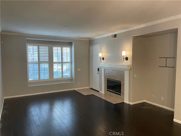 a white building with a fireplace