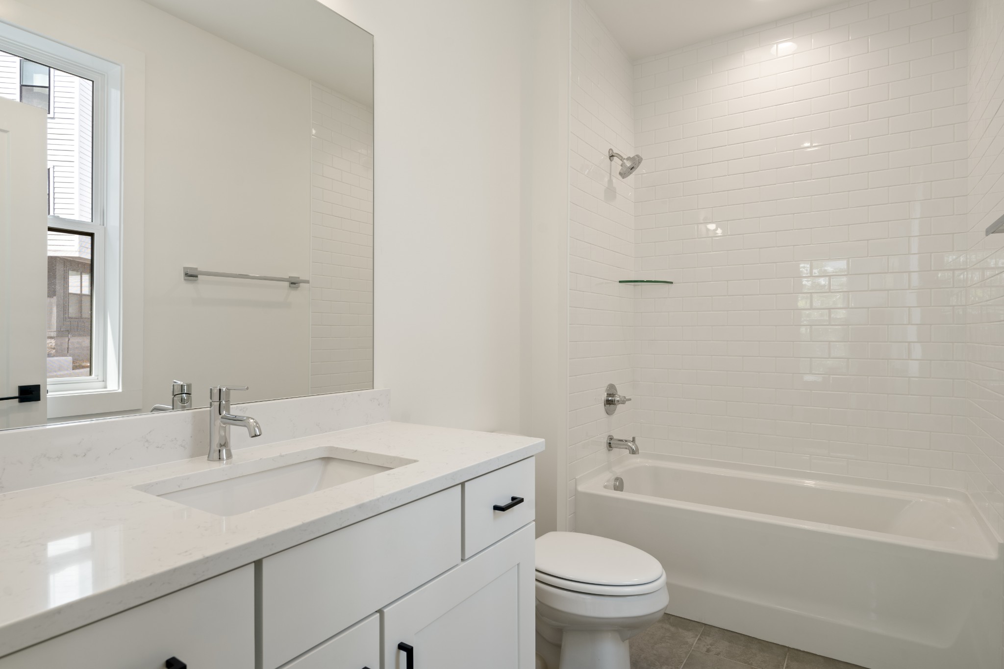 505 Community Court, Unit 11 Nashville, TN 37209 - Photo 19 of 37 a bathroom with a sink a toilet and shower