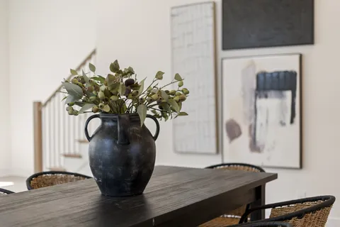 a view of a brick house with a large window