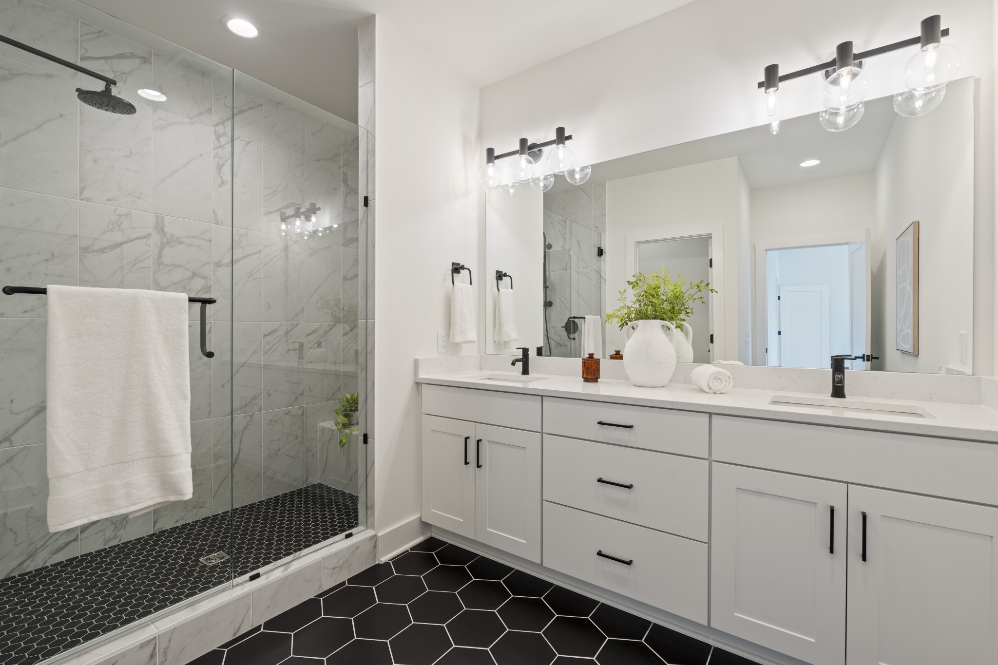 505 Community Court, Unit 11 Nashville, TN 37209 - Photo 26 of 37 a bathroom with a double sink shower and a mirror