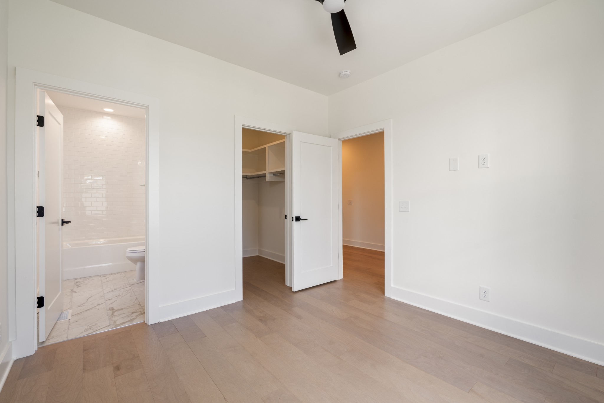 505 Community Court, Unit 11 Nashville, TN 37209 - Photo 31 of 37 an empty room with closet and a ceiling fan