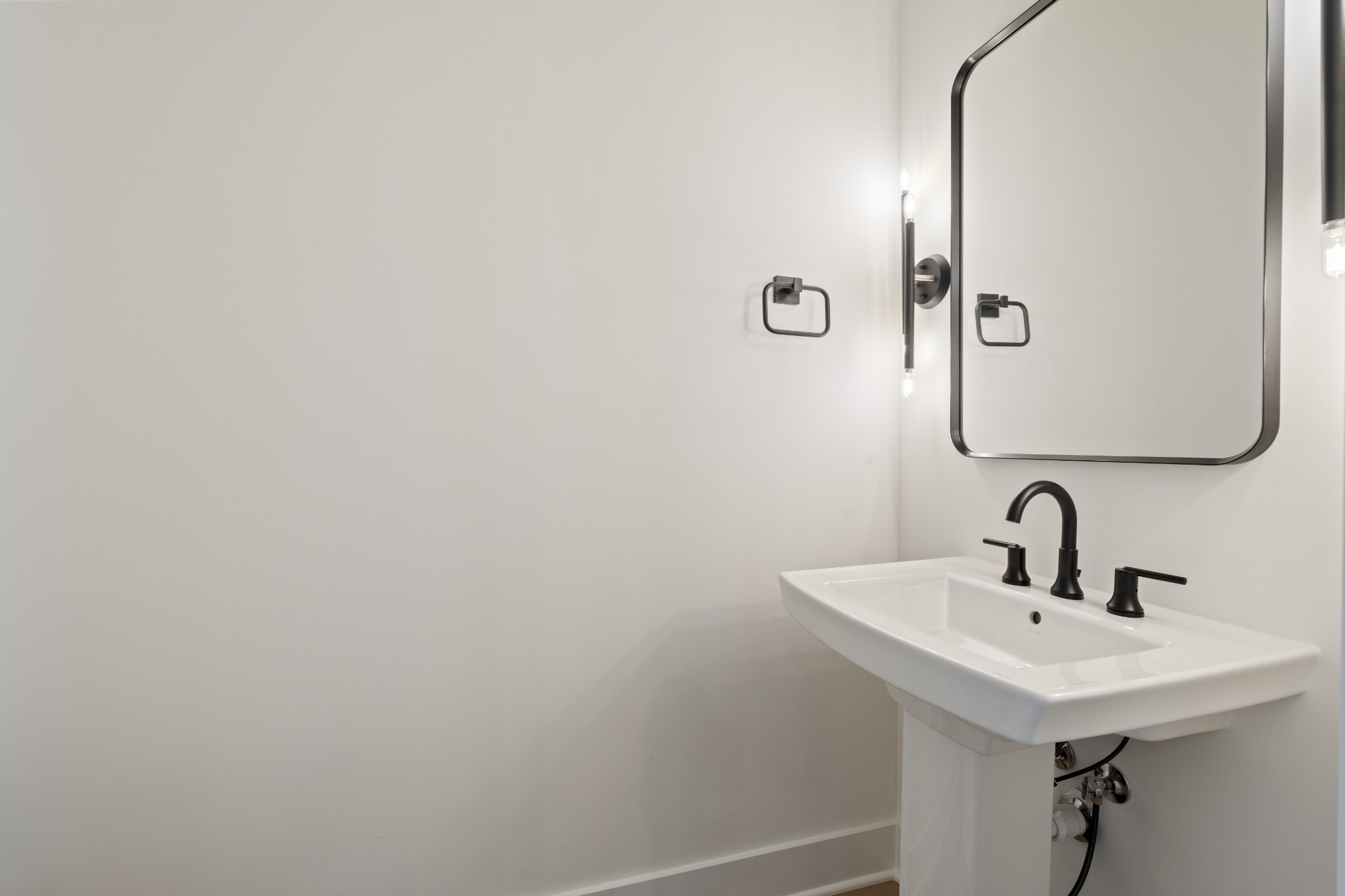 505 Community Court, Unit 11 Nashville, TN 37209 - Photo 34 of 37 a bathroom with a sink and a mirror