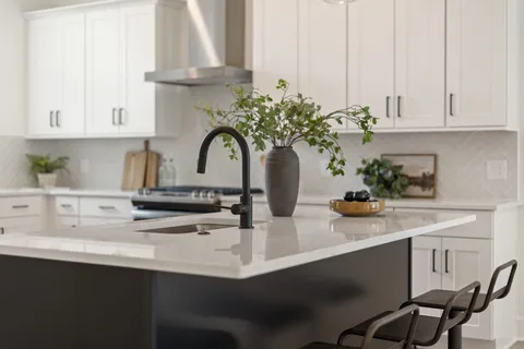 a kitchen with appliances and cabinets