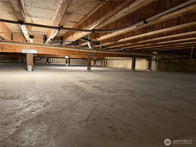 a view of a room with racks on the wall