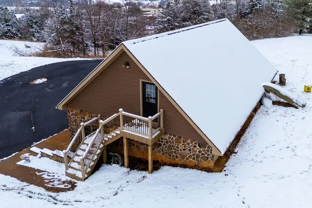 a view of a dinning table and chair in the patio