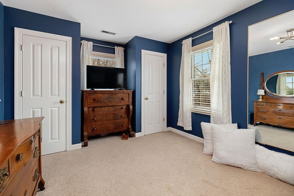 840 Commerce Road Staunton, VA 24401 - Photo 44 of 67 a living room with furniture and a window
