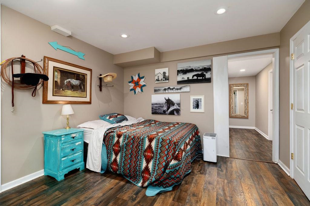 840 Commerce Road Staunton, VA 24401 - Photo 53 of 67 a bedroom with a bed and a view of kitchen