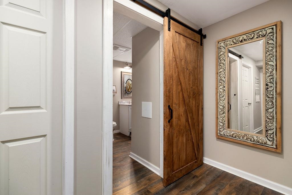 840 Commerce Road Staunton, VA 24401 - Photo 56 of 67 a view of a bathroom with wooden floor and a bathroom