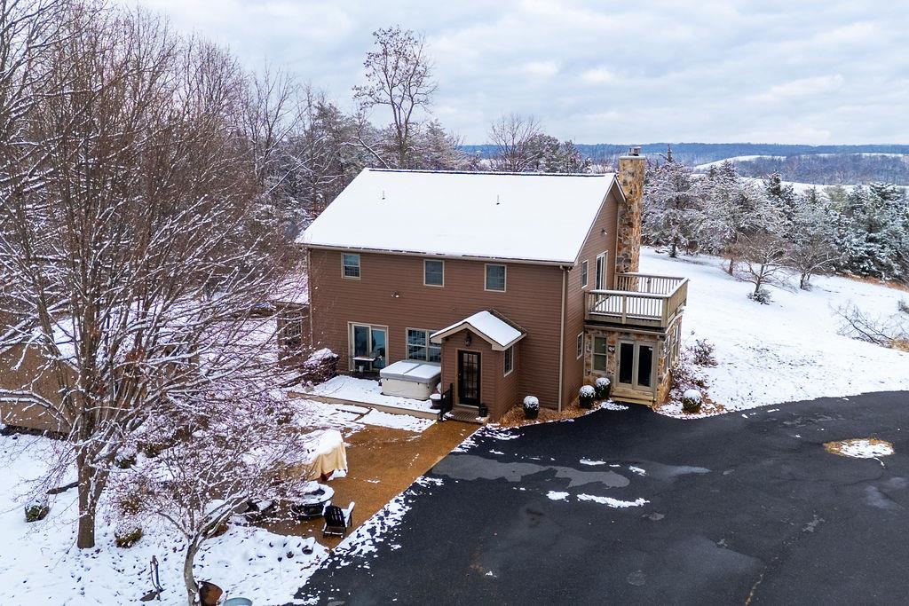 840 Commerce Road Staunton, VA 24401 - Photo 6 of 67 a view of a house with a patio