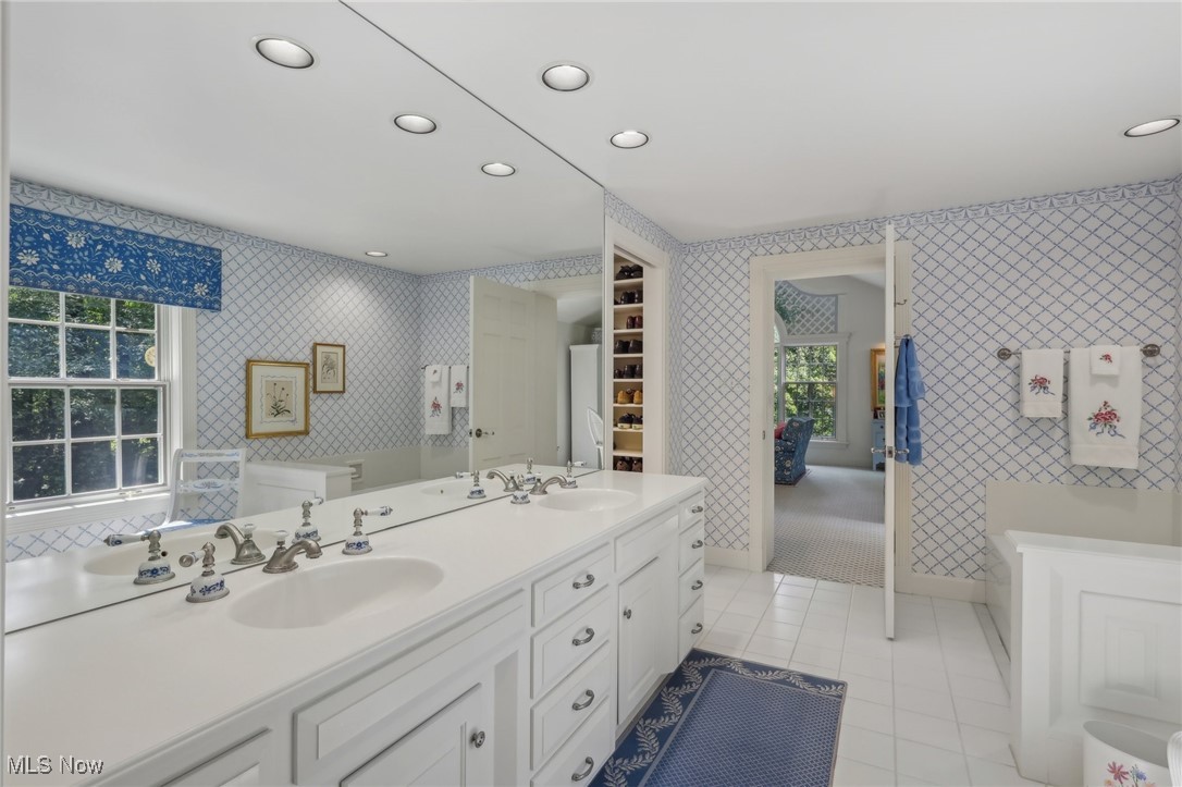 2060 Stockbridge Road Akron, OH 44313 - Photo 22 of 41 Bathroom with vanity and tile patterned floors