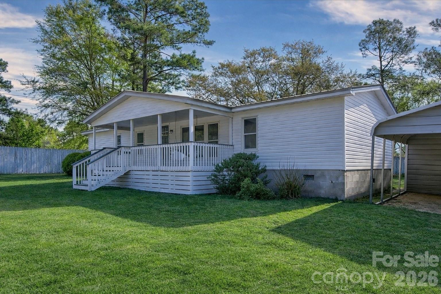 4282 Fred Gardner Road Kershaw, SC 29067 - Photo 2 of 36 a view of a house with a yard and a garden