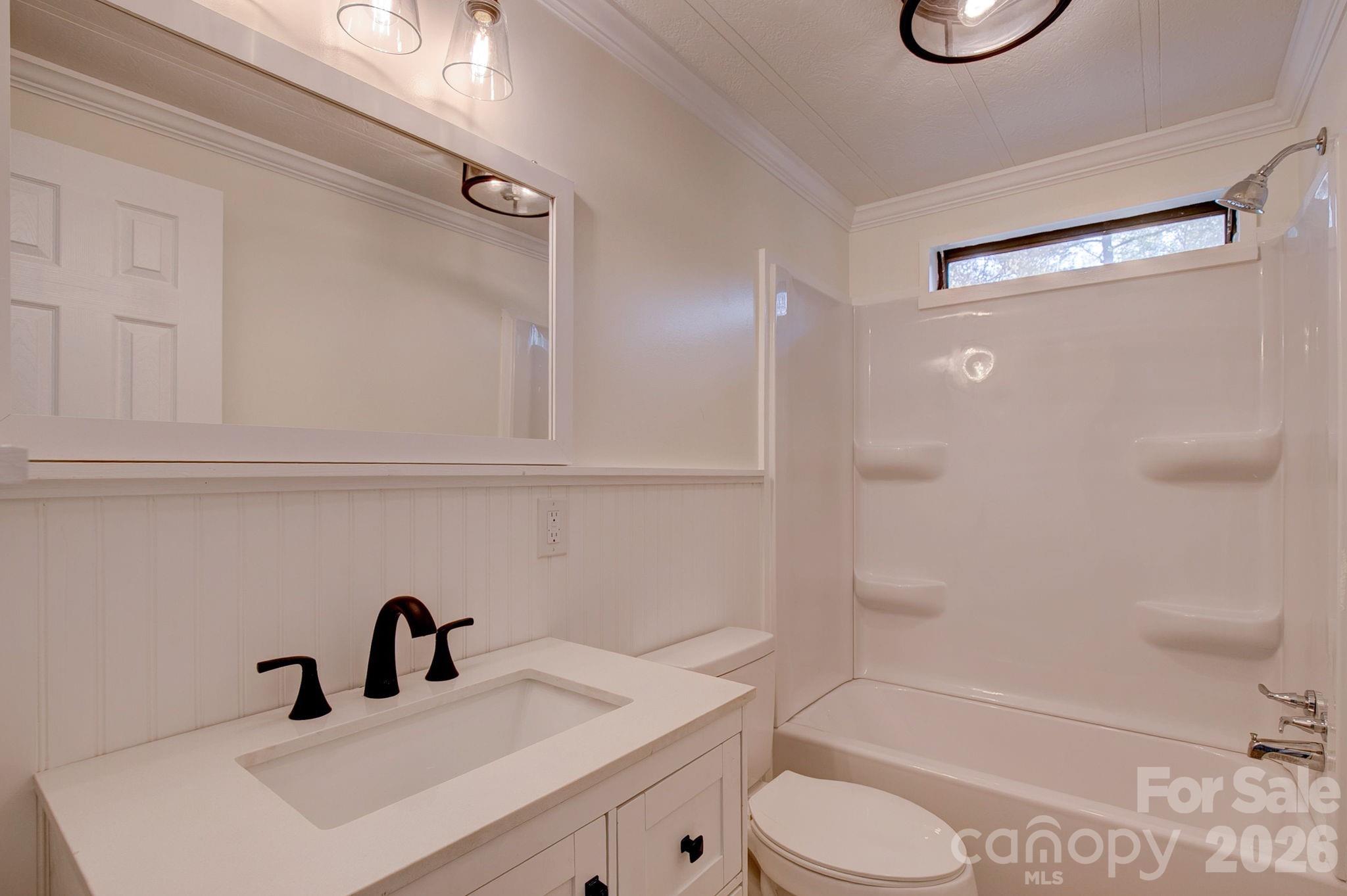 4282 Fred Gardner Road Kershaw, SC 29067 - Photo 29 of 36 a bathroom with a sink toilet and shower