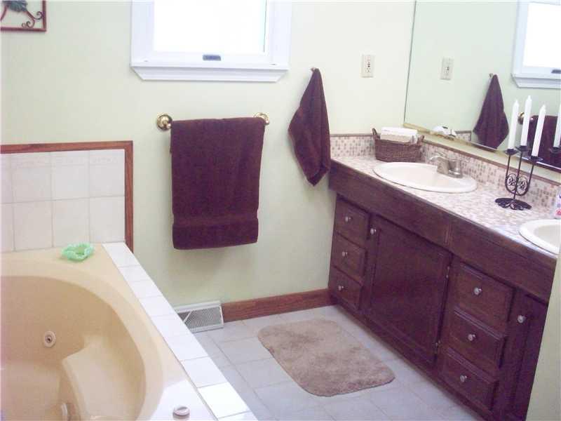 48 Reno Road Hermitage, PA 16148 - Photo 14 of 21 Master Bath/Spa. Master Bath right off of Master Bedroom. Jet spray tub, double sinks and shower stall.