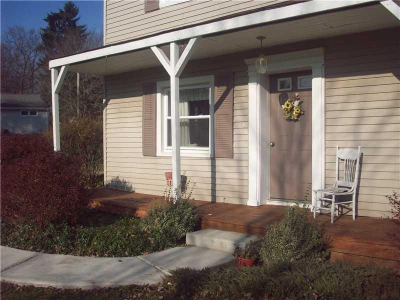 48 Reno Road Hermitage, PA 16148 - Photo 21 of 21 Exterior Front. Front porch area. Curved walkway. Home freshly painted in many areas.