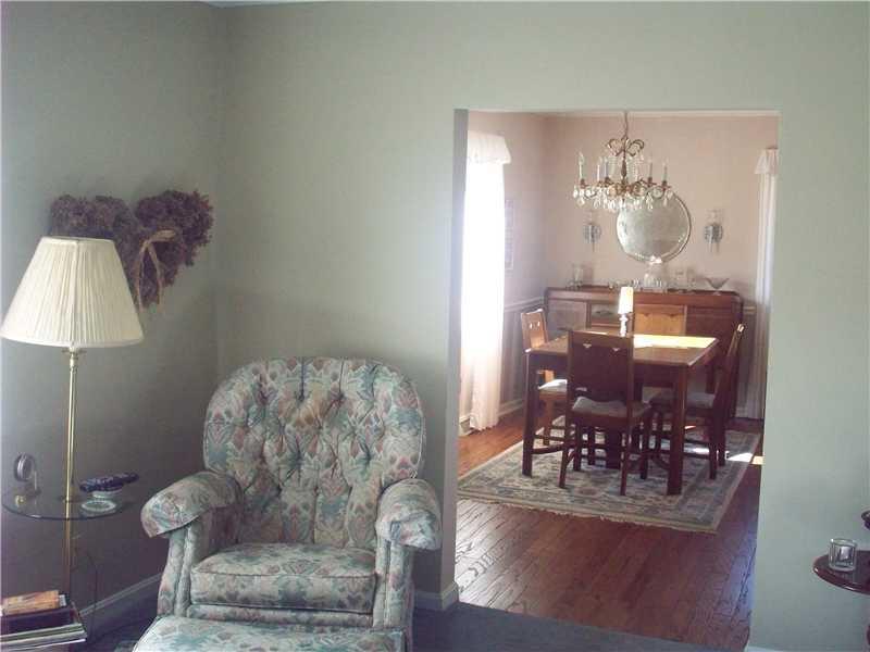 48 Reno Road Hermitage, PA 16148 - Photo 8 of 21 Living Room. Living Room showing Dining Room right off of it. Front door entrance is off of Dining Room.