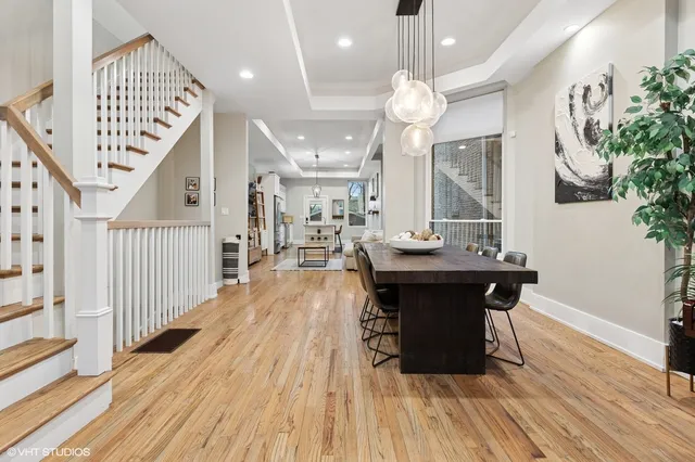 a view of dining room with furniture and wooden floor