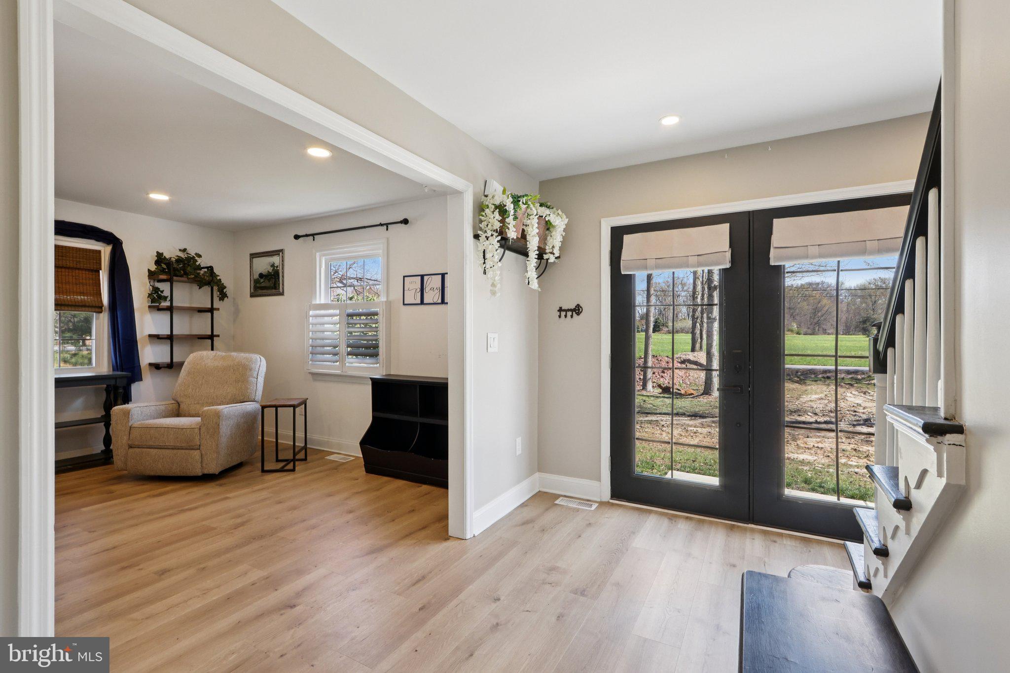 351 Merrick Road Robbinsville, NJ 08691 - Photo 13 of 69 a living room with furniture and a large window