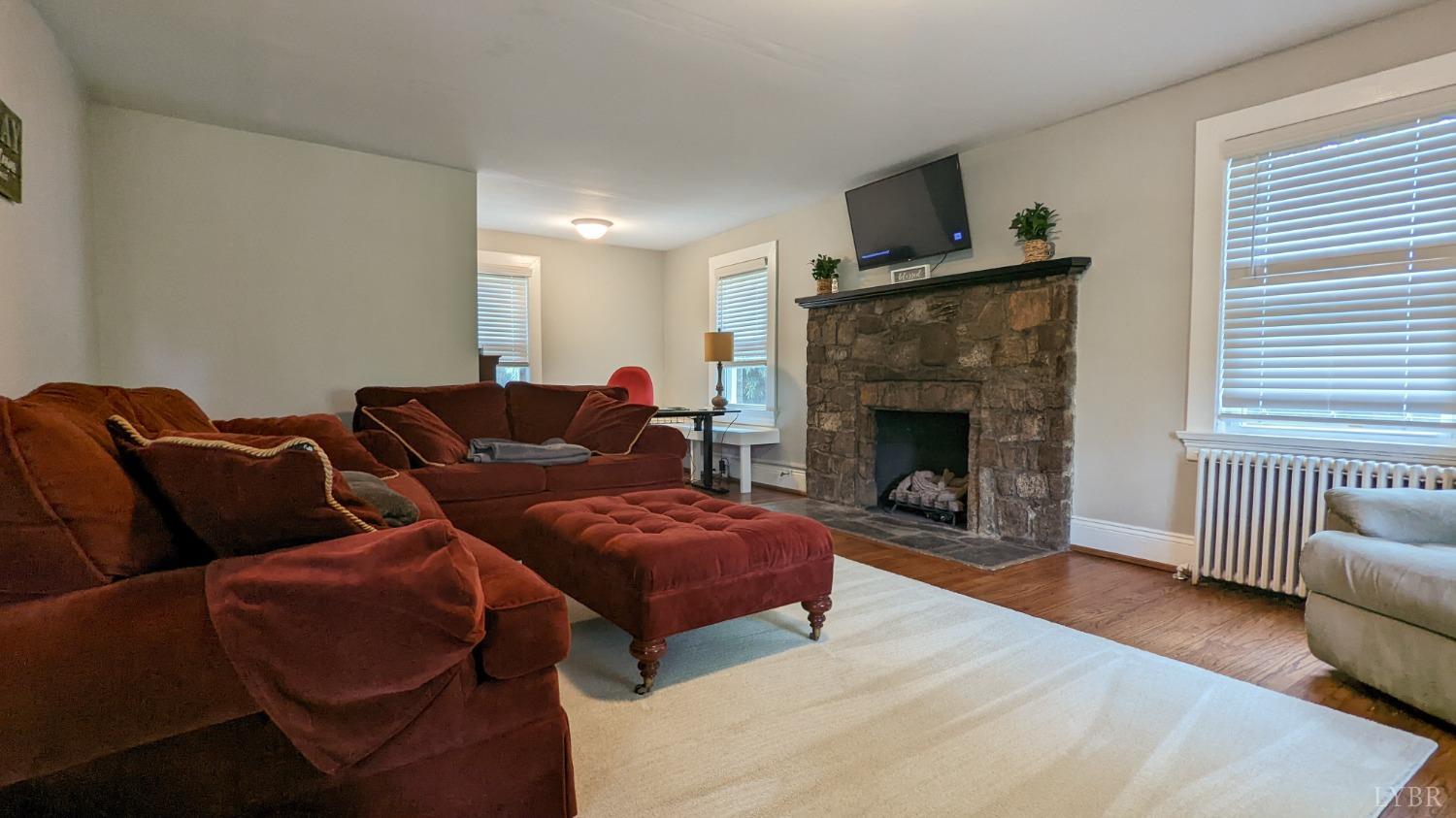 2245 Cedar Gate Road Madison Heights, VA 24572 - Photo 3 of 17 a living room with furniture and a fireplace