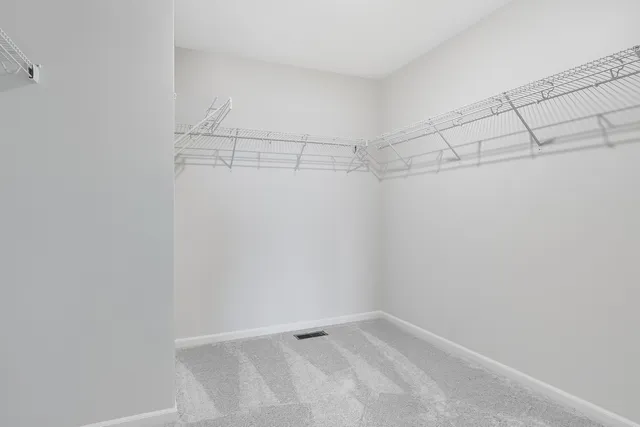 a view of a room with racks on the wall