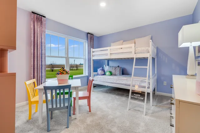 a room with furniture and a window