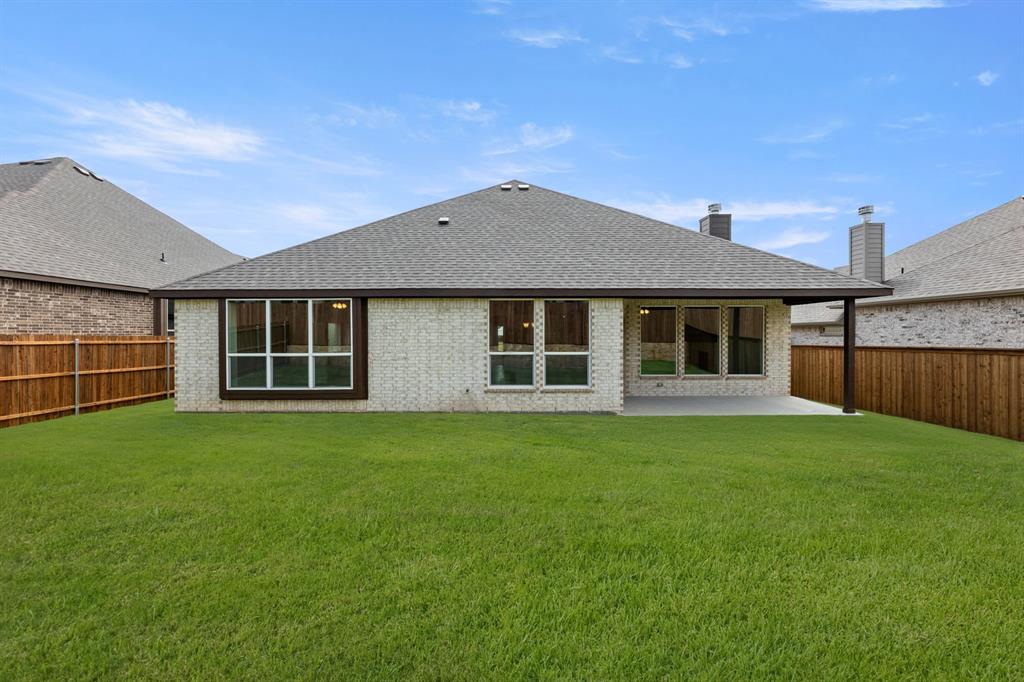 35 Magpie Street Joshua, TX 76058 - Photo 19 of 19 a house view with a garden space