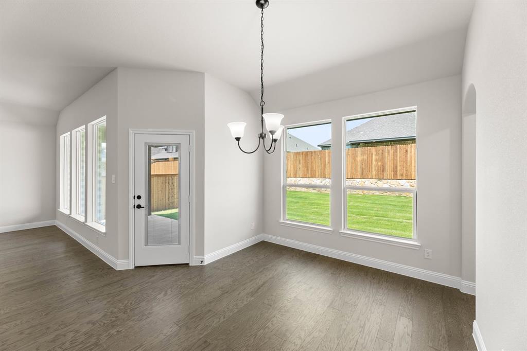 35 Magpie Street Joshua, TX 76058 - Photo 5 of 19 a view of a room with window wooden floor and front door