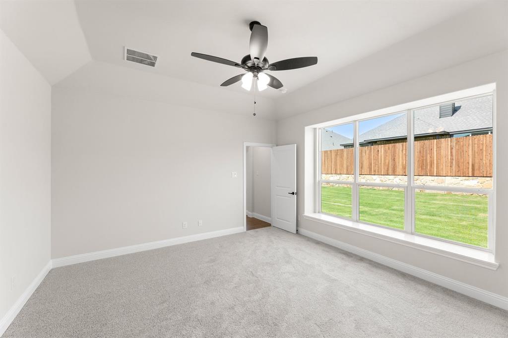 35 Magpie Street Joshua, TX 76058 - Photo 7 of 19 a view of an empty room with a window