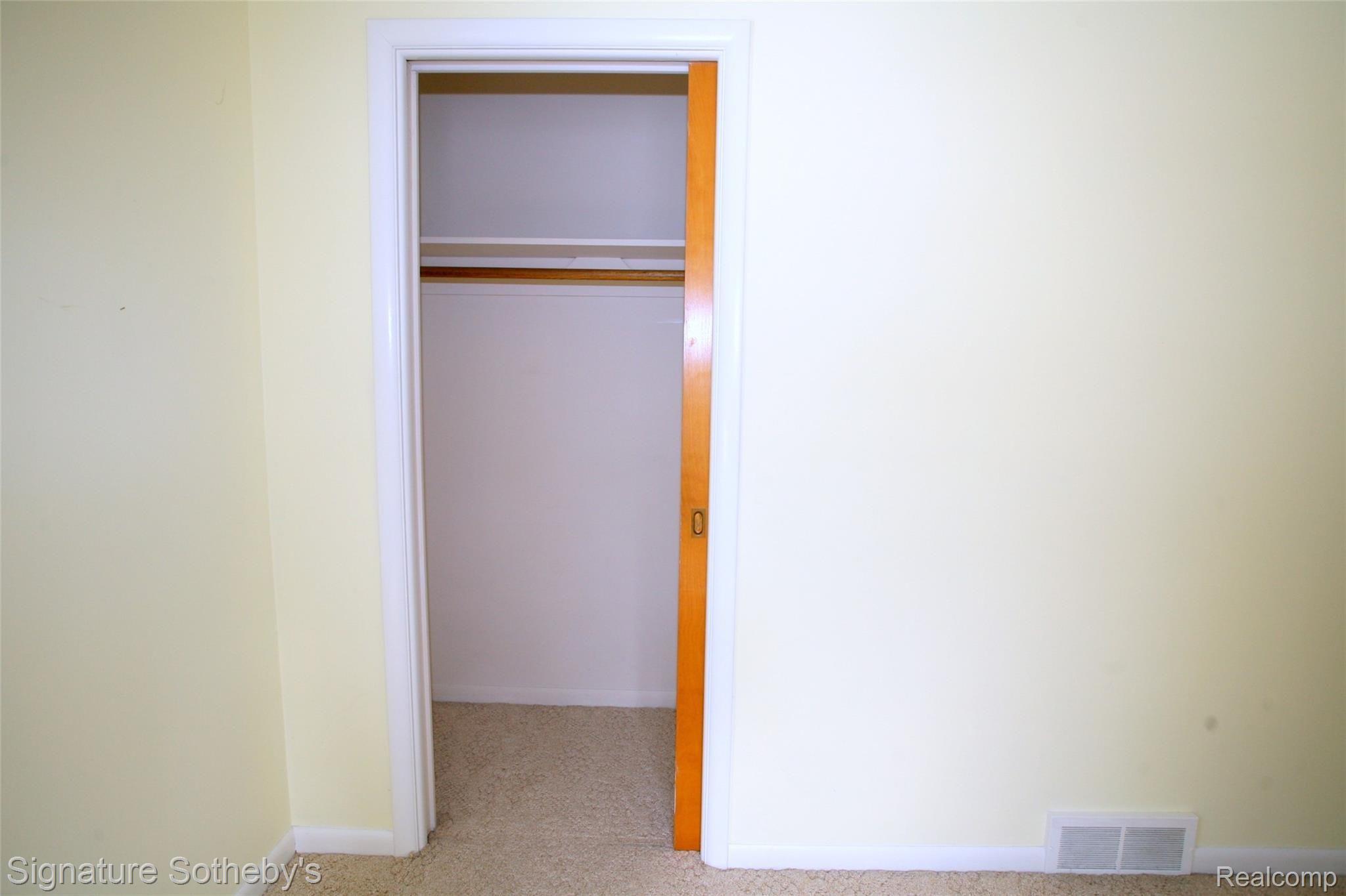 145 North Holcomb Road Clarkston, MI 48346 - Photo 14 of 24 Pocket Door Closet