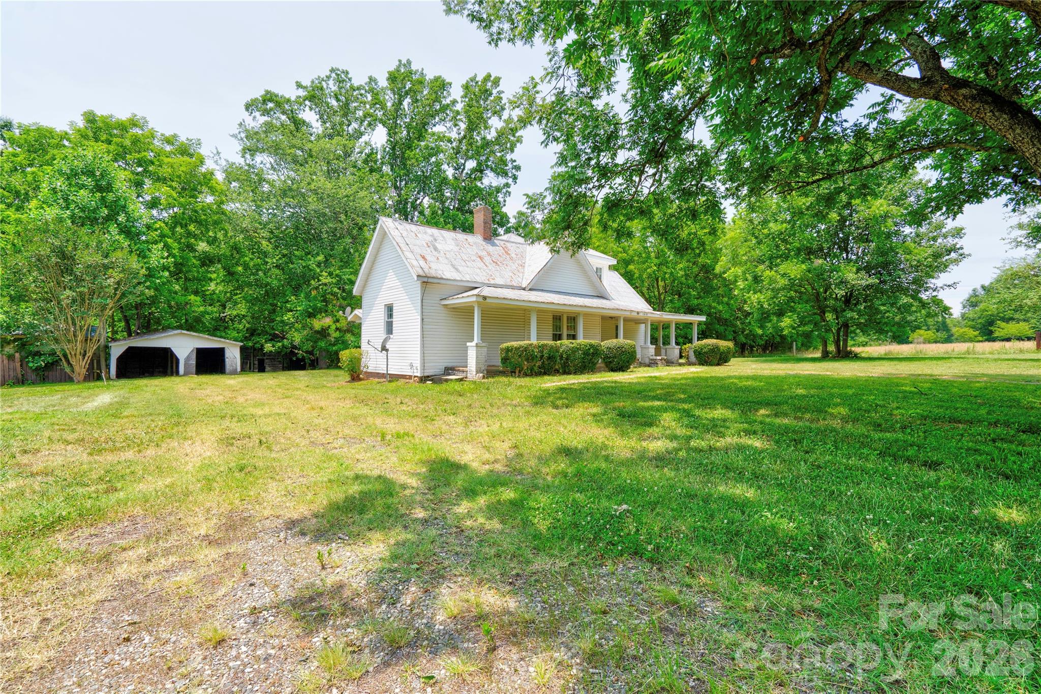 1813 St Marks Church Road Crouse, NC 28033 - Photo 13 of 22 a house with green field in front of it